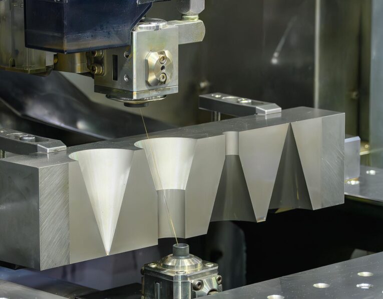 High-precision wire cut EDM machining process for hardened tool steel components at GOALTECH Industries